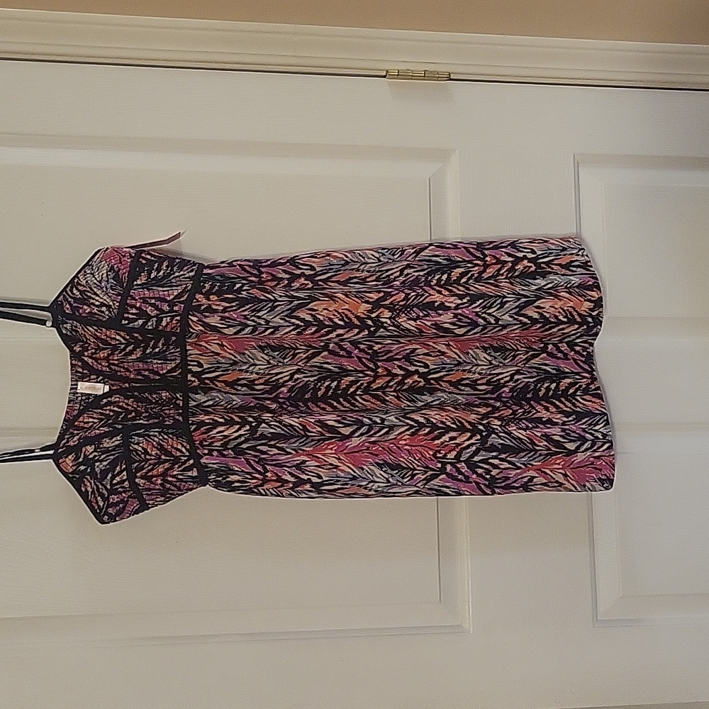 XXL Xhileration black, white, orange, and red colored dress. 100% polyester.